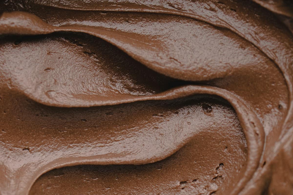 Swirls of glossy chocolate ganache